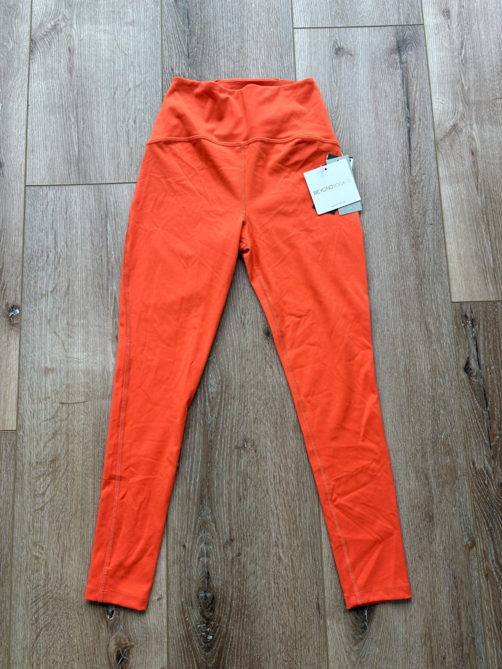 Beyond Yoga High-Waist Leggings in Bright Orange